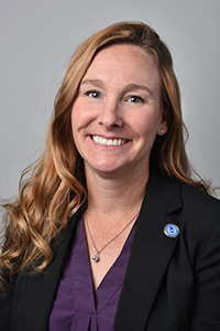 Portrait Photo of Kelly Mack Smiling